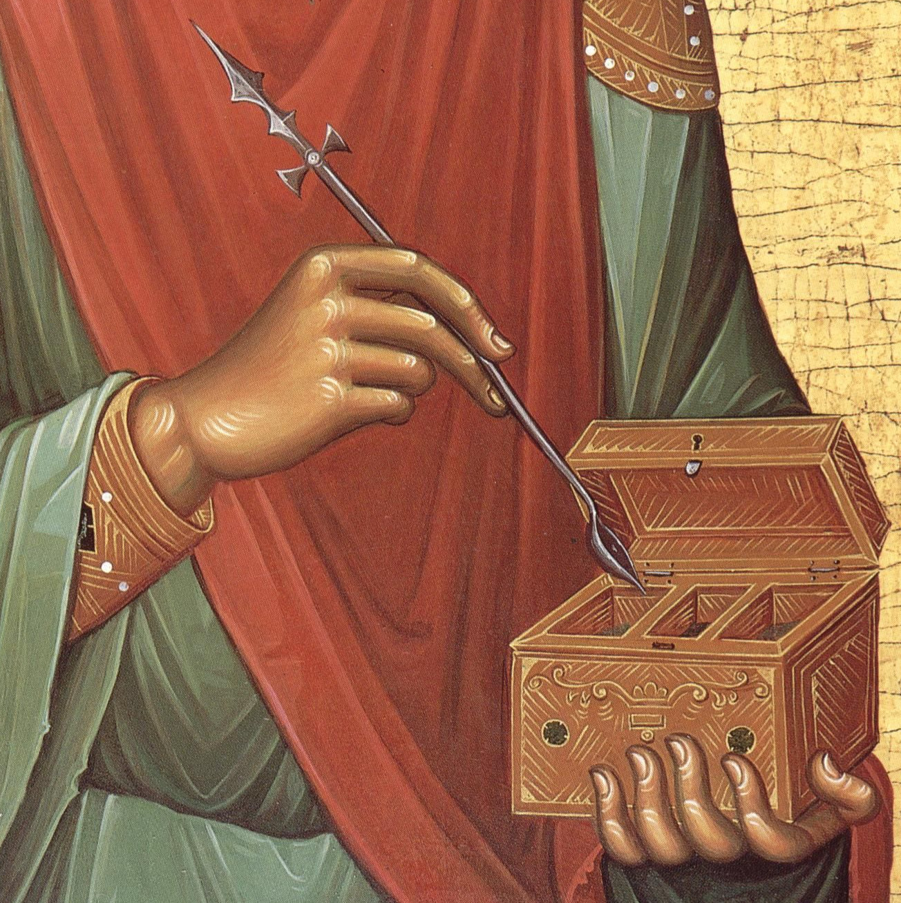 Hands of St. Panteleimon holding a cross and medicine box