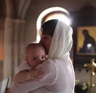 Mother and baby in a Malankara Orthodox church