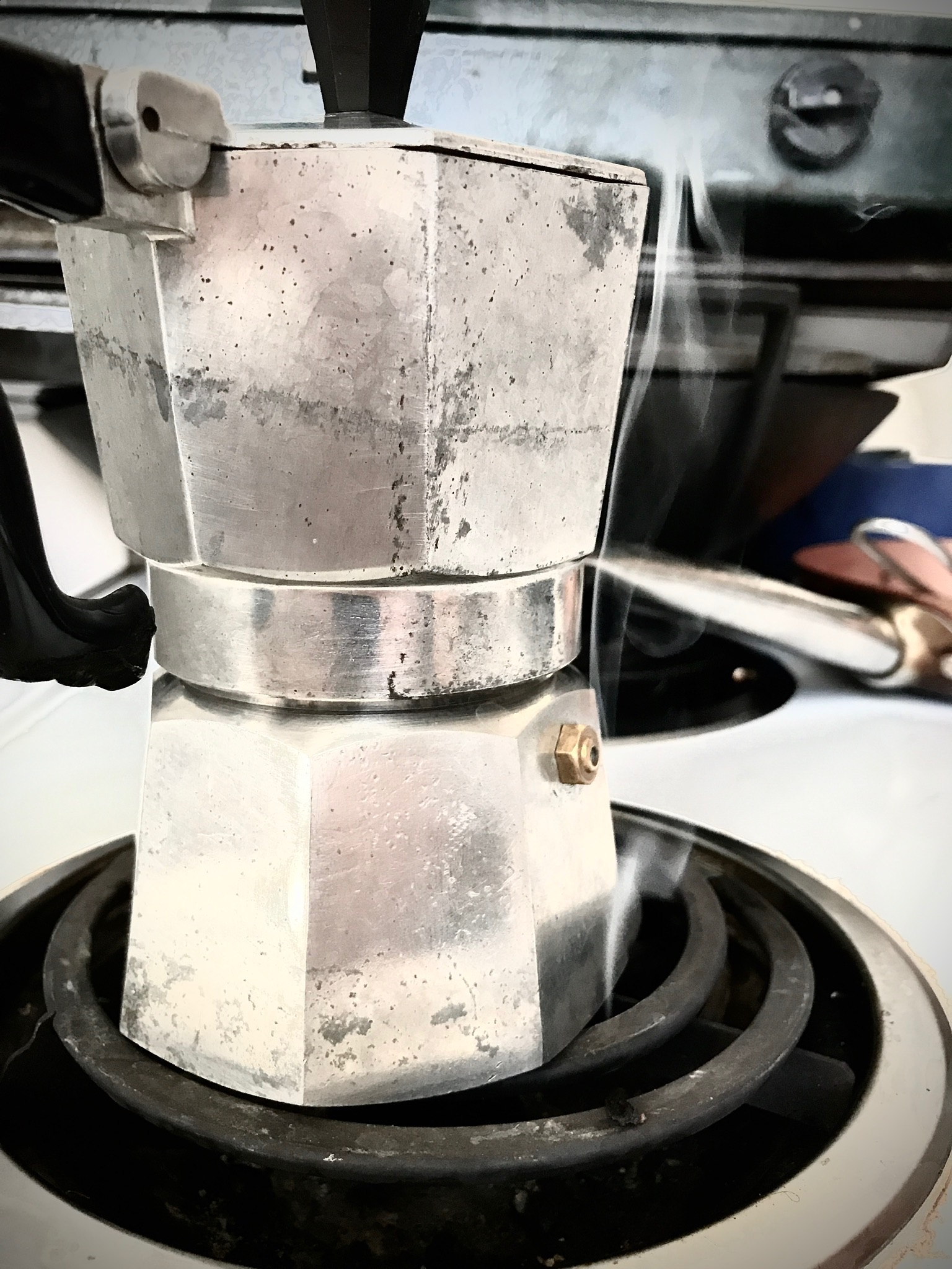 Italian Coffee Pot on a Stove Eye