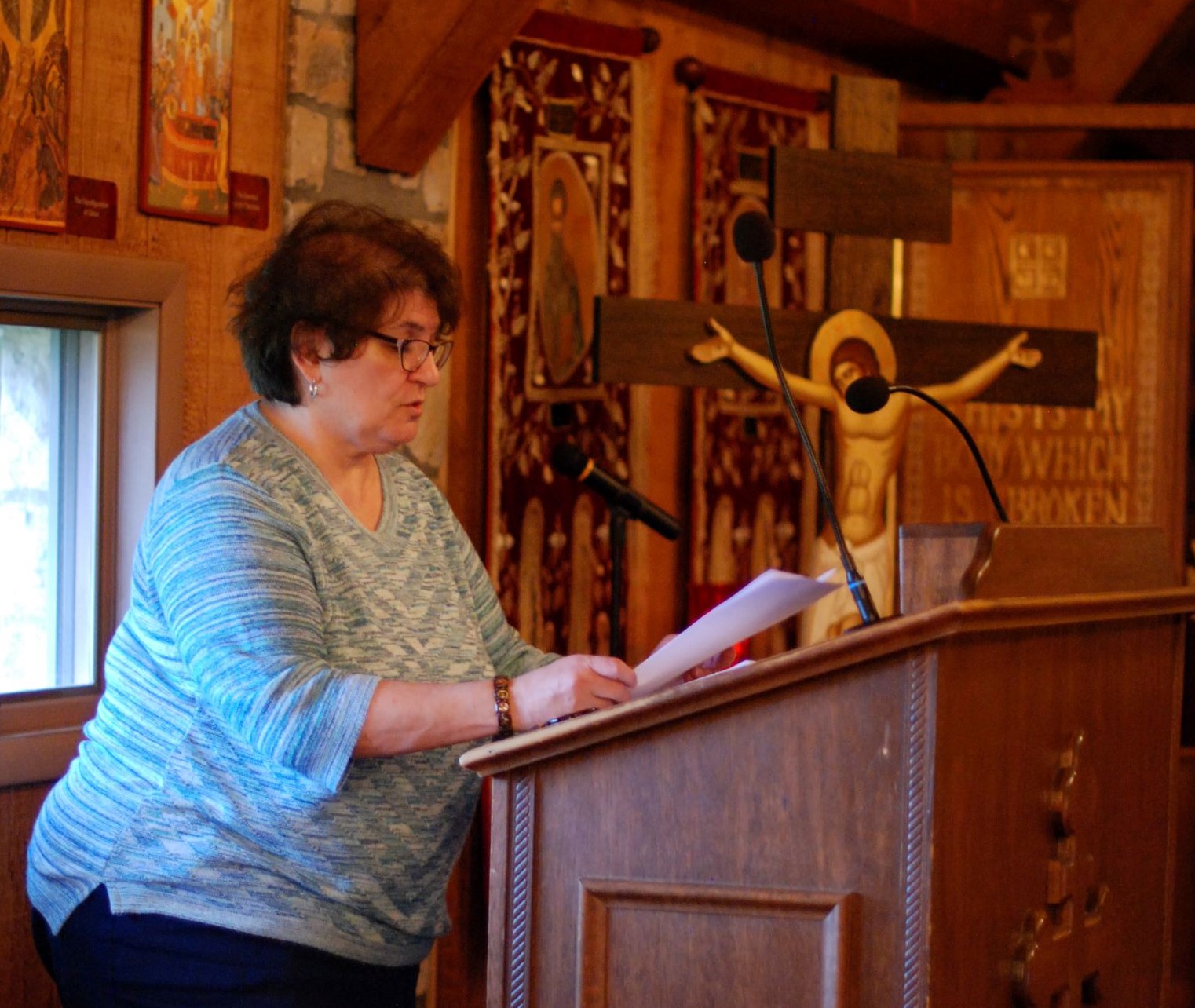 Woman at the chanting stand