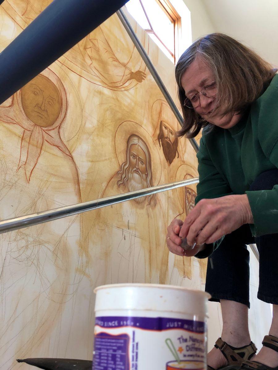 Heather at work on All Saints wall