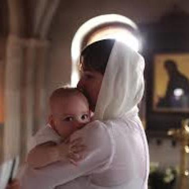 Mother and baby in a Malankara Orthodox church