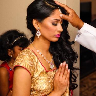 Malankara Woman Receiving a Blessing in Church