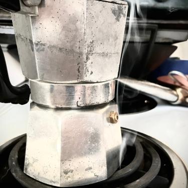 Italian Coffee Pot on a Stove Eye