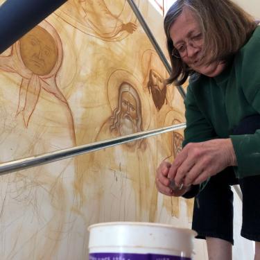 Heather at work on All Saints wall