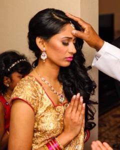 Malankara Woman Receiving a Blessing in Church