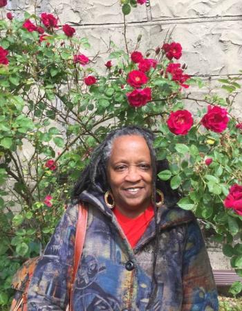 Judith Scott among roses