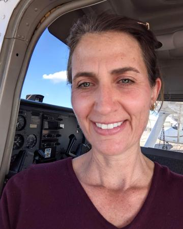 Anastasia McCune, our Woman of the Week, in the cockpit of the airplane she flies